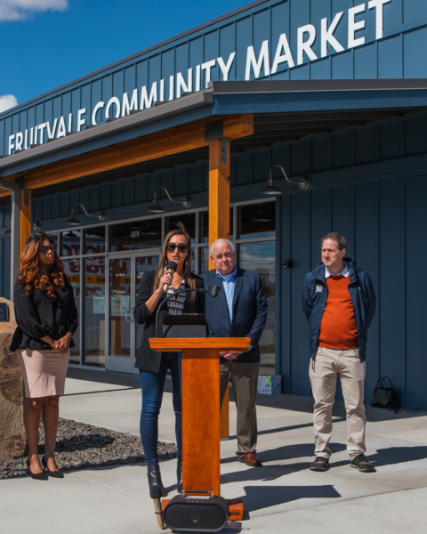 Bree Black Horse speaks at the opening of Northwest Harvest's Fruitvale Community Market